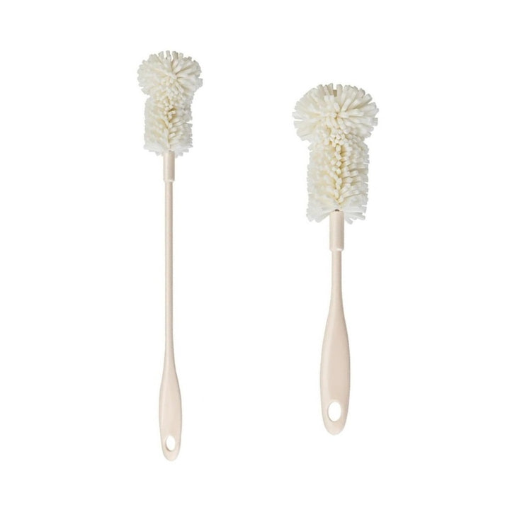 Two polyester cleaning brushes with mop-like heads, one regular and one long, designed for scrubbing penis pump cylinders.