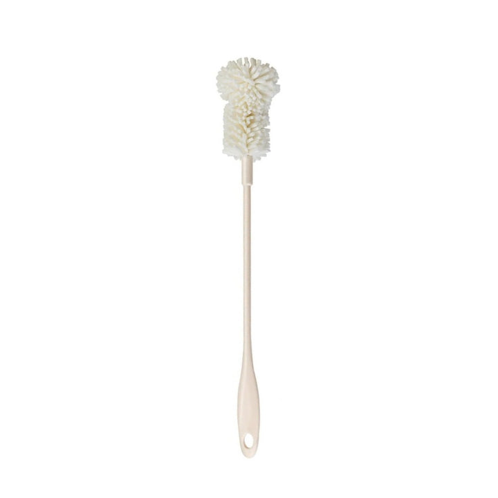A long off-white cleaning brush with a polyester mop head for cleaning the interior of penis pump cylinders