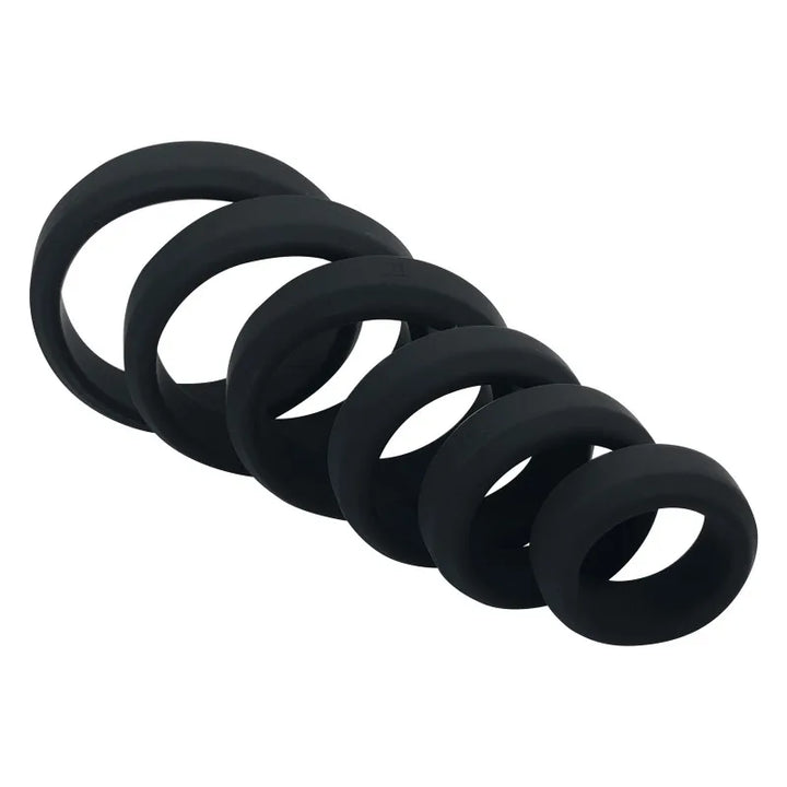 Image of six black flat cock rings spread out