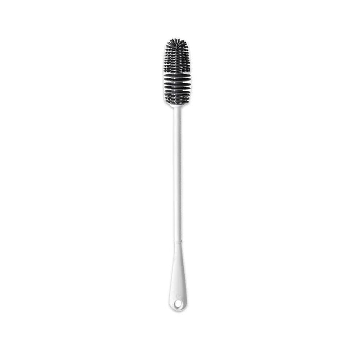 Product photo of a white silicone long cleaning brush for vacuum pump cylinders