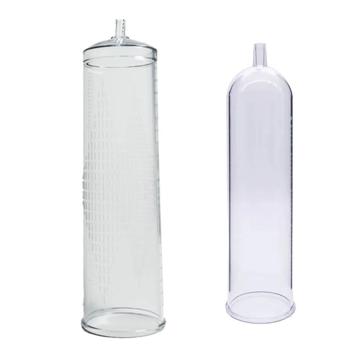 Two clear cylindrical replacement parts for starter manual air penis pumps, the larger one with a textured surface and ruler-labeled imprint, and the other a smaller and more rounded cylinder. Both are made of a translucent ABS plastic with a top opening that connects to a hose, and  bottom opening where the penis is inserted for pumping