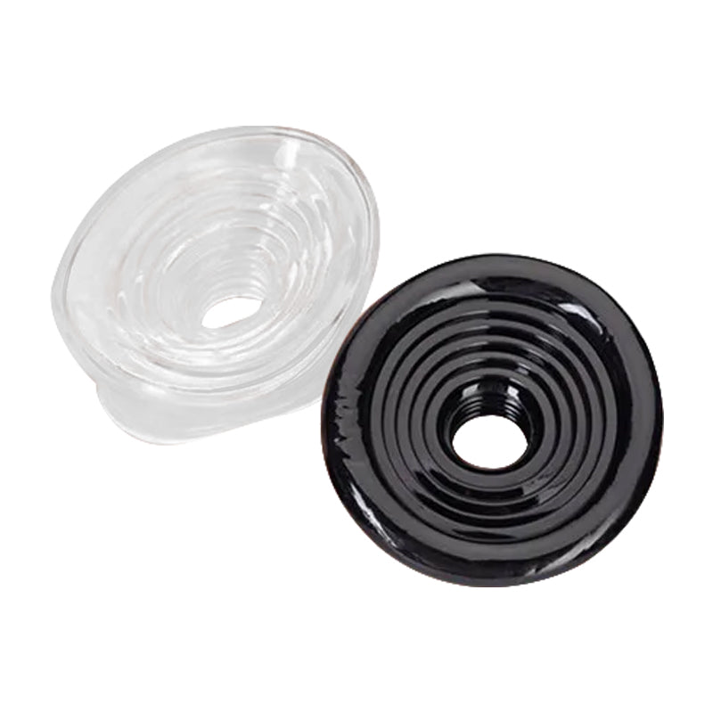 Two penis pump sleeve covers with ribbed texture, one clear white and one opaque black colors, on a white background