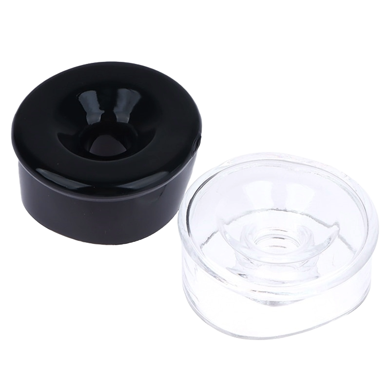 The image shows two silicone sleeve covers for penis pump cylinders, one black and one transparent. Both have a rounded shape with a central hollow part for inserting the penis for a pumping session.