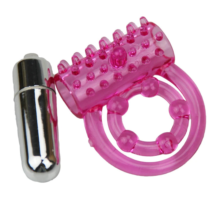 An image showing a magenta vibrating double-band cock ring with a stainless steel bullet tube next to it
