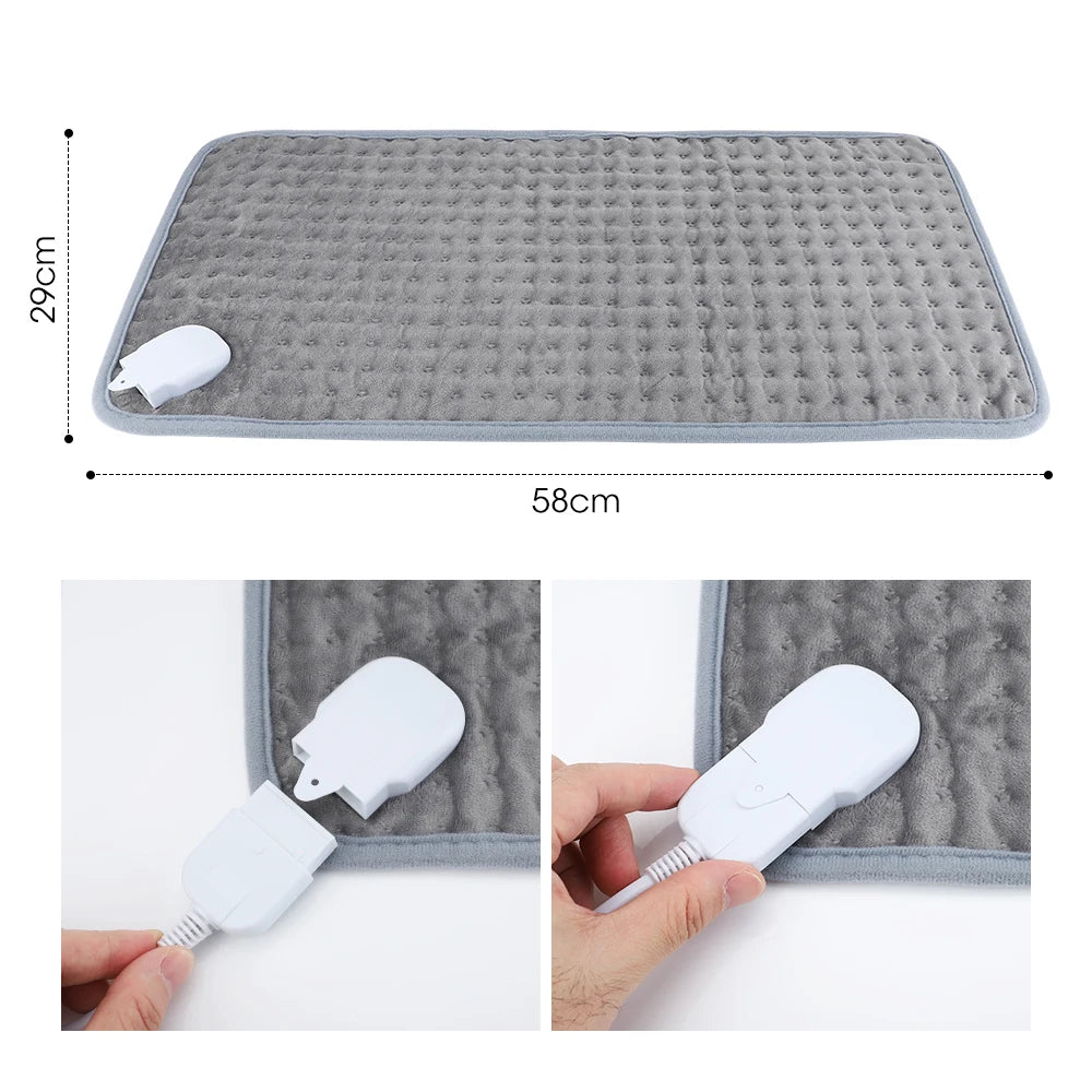 An image showing the electric heating pad dimensions of 58 cm long and 29 cm wide, and connection instructions of simply plugging the white electric cord into the white socket on heating pad