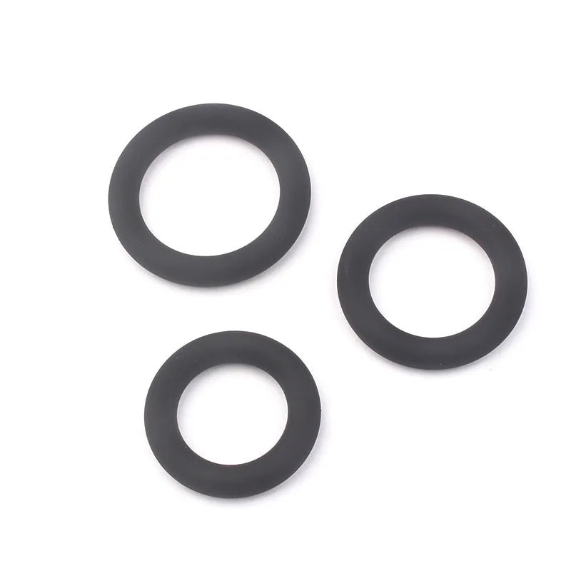 This image shows three black color coded cylindrical cock rings