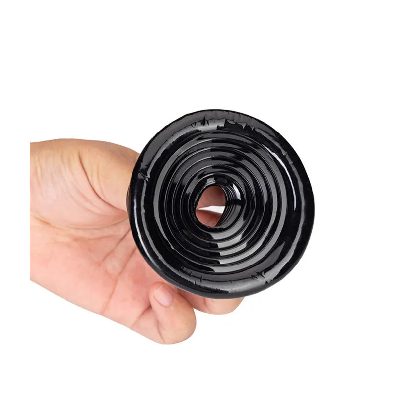 An image showing a black ribbed texture sleeve cover being held in a man's hand