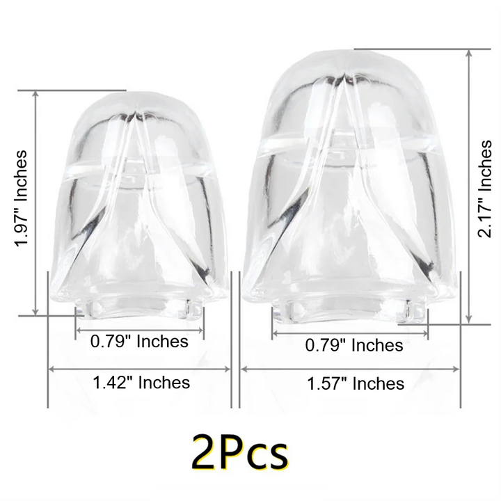 Two clear silicone glans cap penis covers showing dimensions of two different sizes in the package. Small size measures 1.97" inches in length with a 0.79" inch opening, and a 1.42" inch width at the base. Large size measures 2.17" inches in length, with a 0.79" inch insertable opening and a 1.57" inch width at the base. Two (2) pieces is written on the photo.