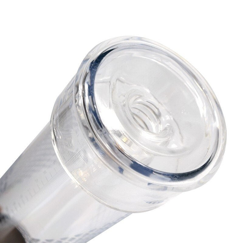 A clear transparent silicone sleeve affixed to a round cylindrical tube of a vacuum pump
