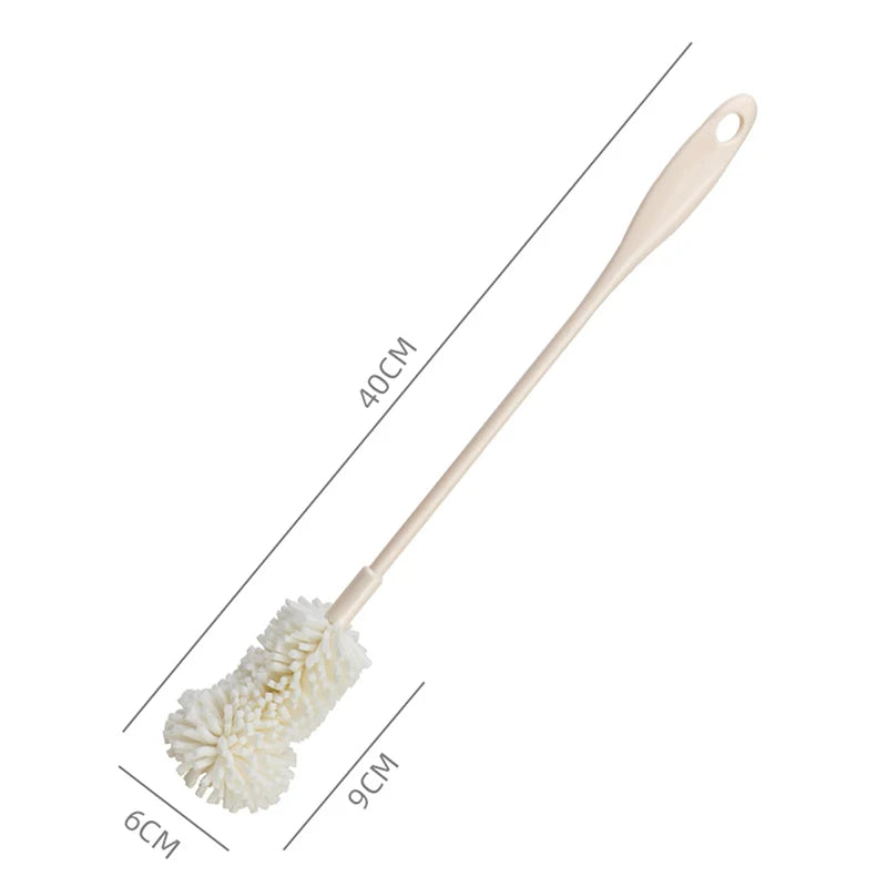 A dimensions graphic showing the length of 40 cm, and mop-like head of 6 cm wide and 9 cm long, for the long polyester pump cleaning brush