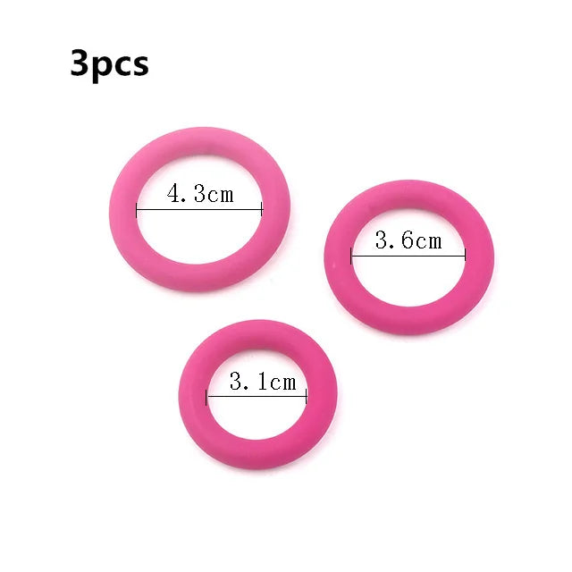 This image shows three magenta colored cock rings and their internal diameters