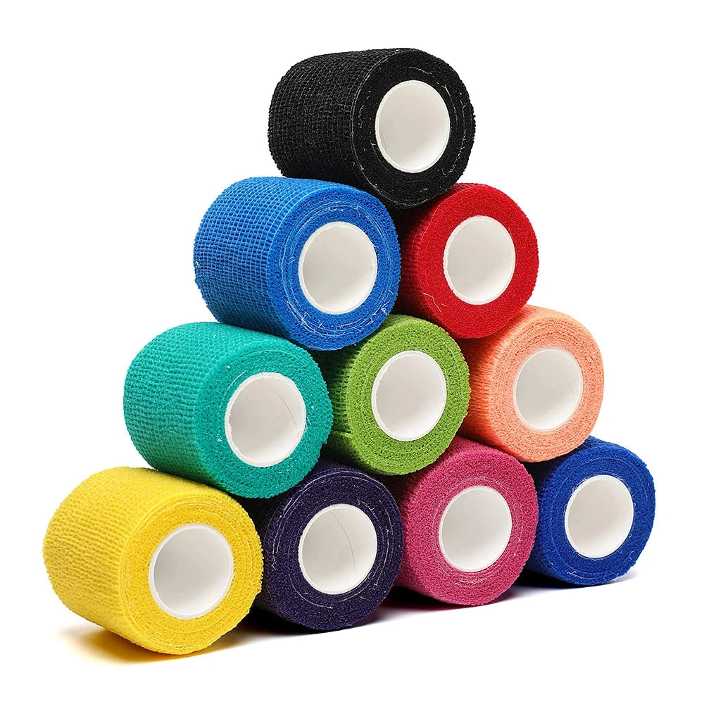 A stack of various colored athletic wraps, used for penis enlargement and support during physical activities.