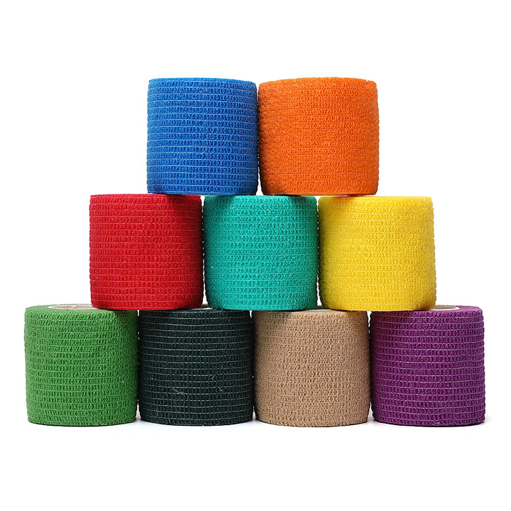 Image showing nine different rolls of athletic wrap in different rainbow colors stacked on top of one another in rows of four, three, and two.