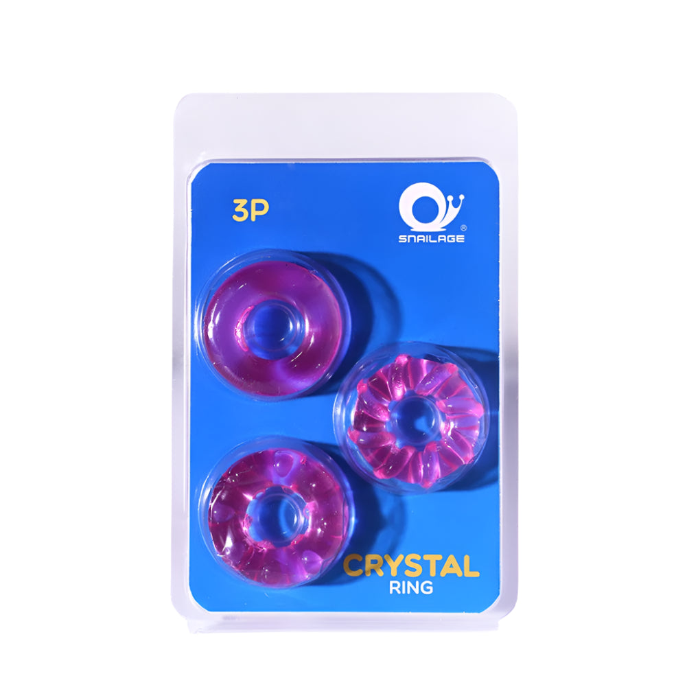 Packaged silicone pink rings with different textures on a blue background
