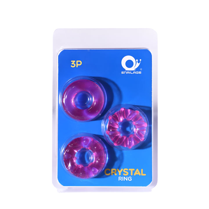 Packaged silicone pink rings with different textures on a blue background