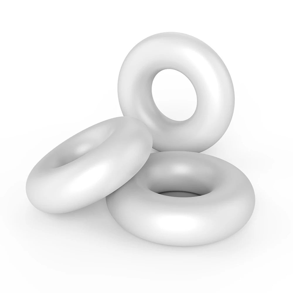 Three white, thick, premium cylindrical cock rings stacked on top of each other against a white background.