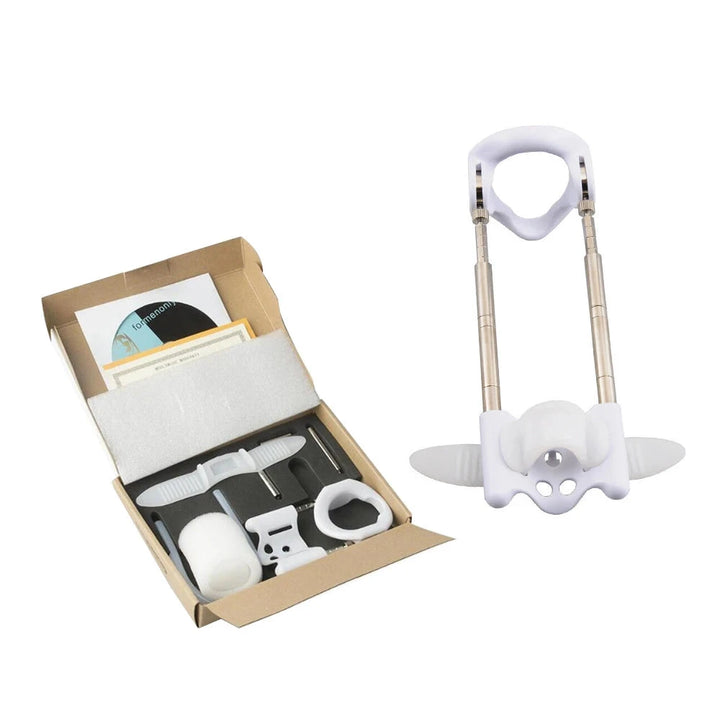 The image shows a ProStretch Noose-Style Penis Extender with its components laid out next to the packaging box. The device includes a sturdy base that goes around the penis, brass metal pole rods that can increase the length of the extender, and various sized metal rods for tension adjustment. There's also a cd and user manual.