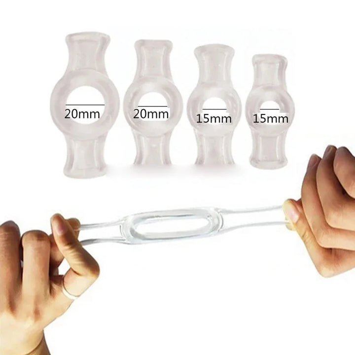 An image showing dimensions of four clear cock rings with pullable side tabs with sizes of 20 mm, 20 mm, 15 mm, and 15 mm, with one being pulled on both ends by two hands at the bottom of the image