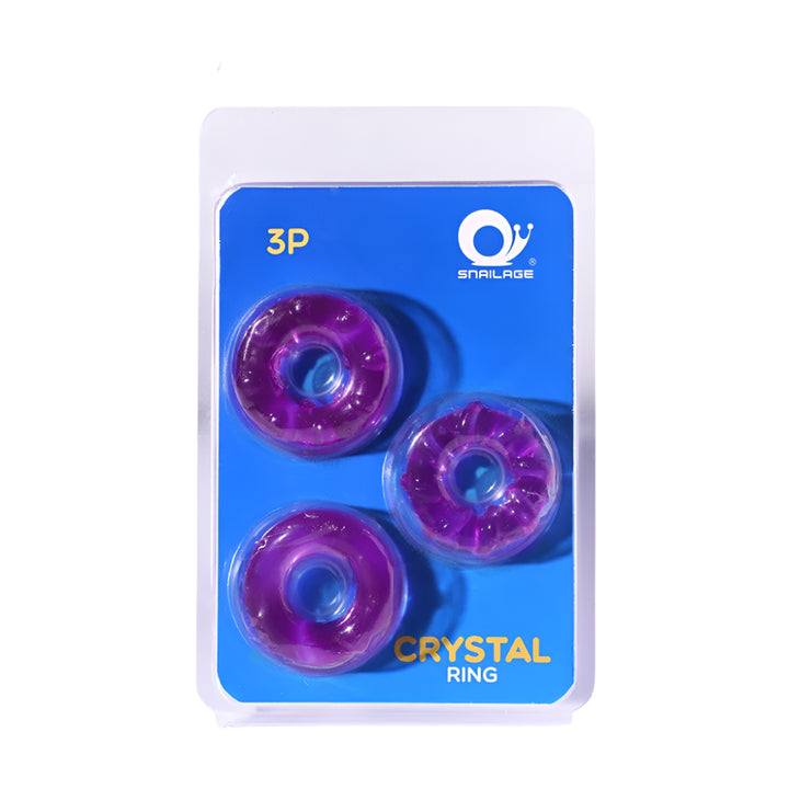 Three packaged silicone purple color cock rings with different designs on a blue background