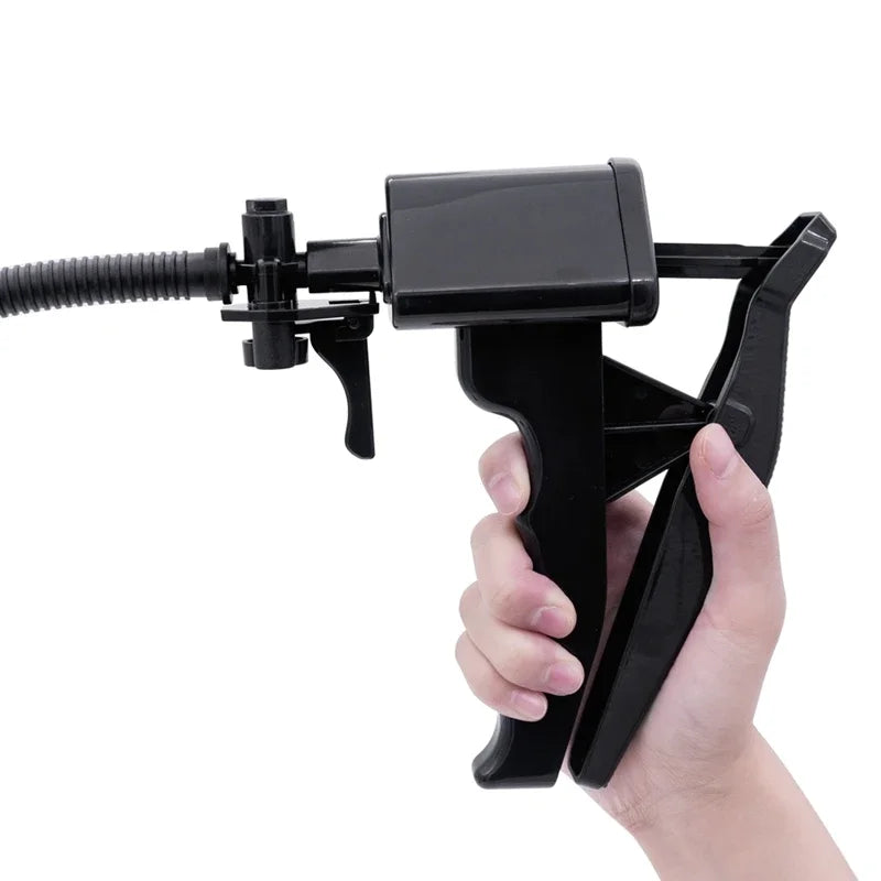 An image showing a man squeezing the pistol-trigger-handle on the starter manual-trigger penis pump to operate and remove air