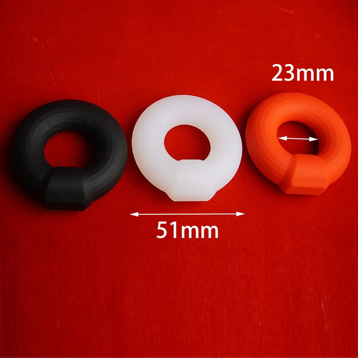 Three silicone constriction bands in black, white, and red on a red background with measurements indicated.