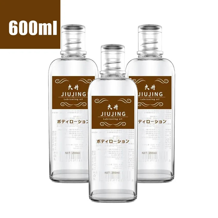 This image shows three clear bottles of 200 ml JiuJing lubricating oil on a white background with a label of 600 ml