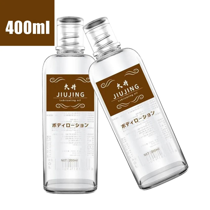 This image shows two 200 ml bottles of JiuJing Lubricating Oil with one bottle tilted on a white background and a label of 400 total ml